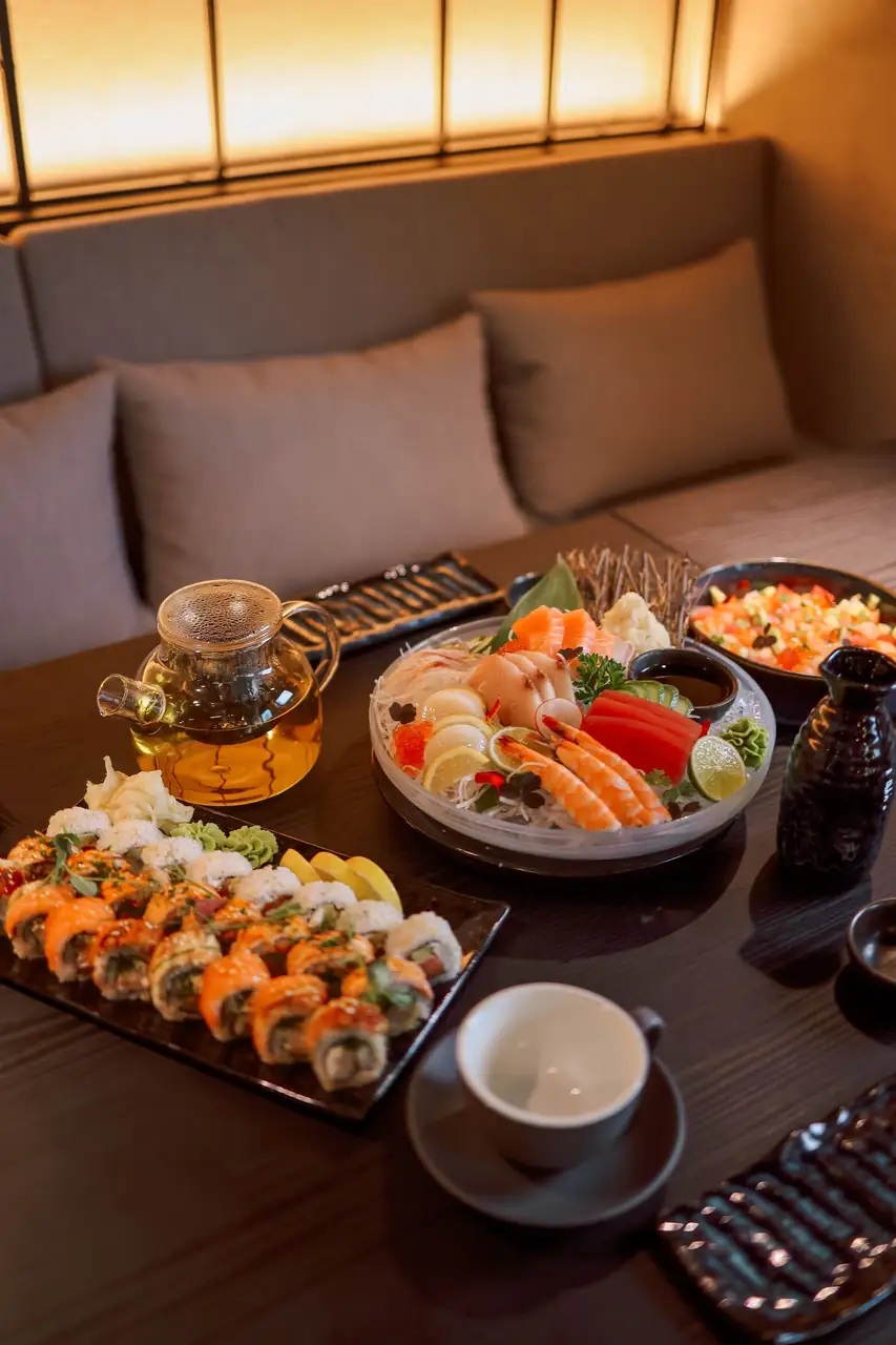 Gourmet sushi dinner set with assorted rolls and sashimi arranged in quiet harmony